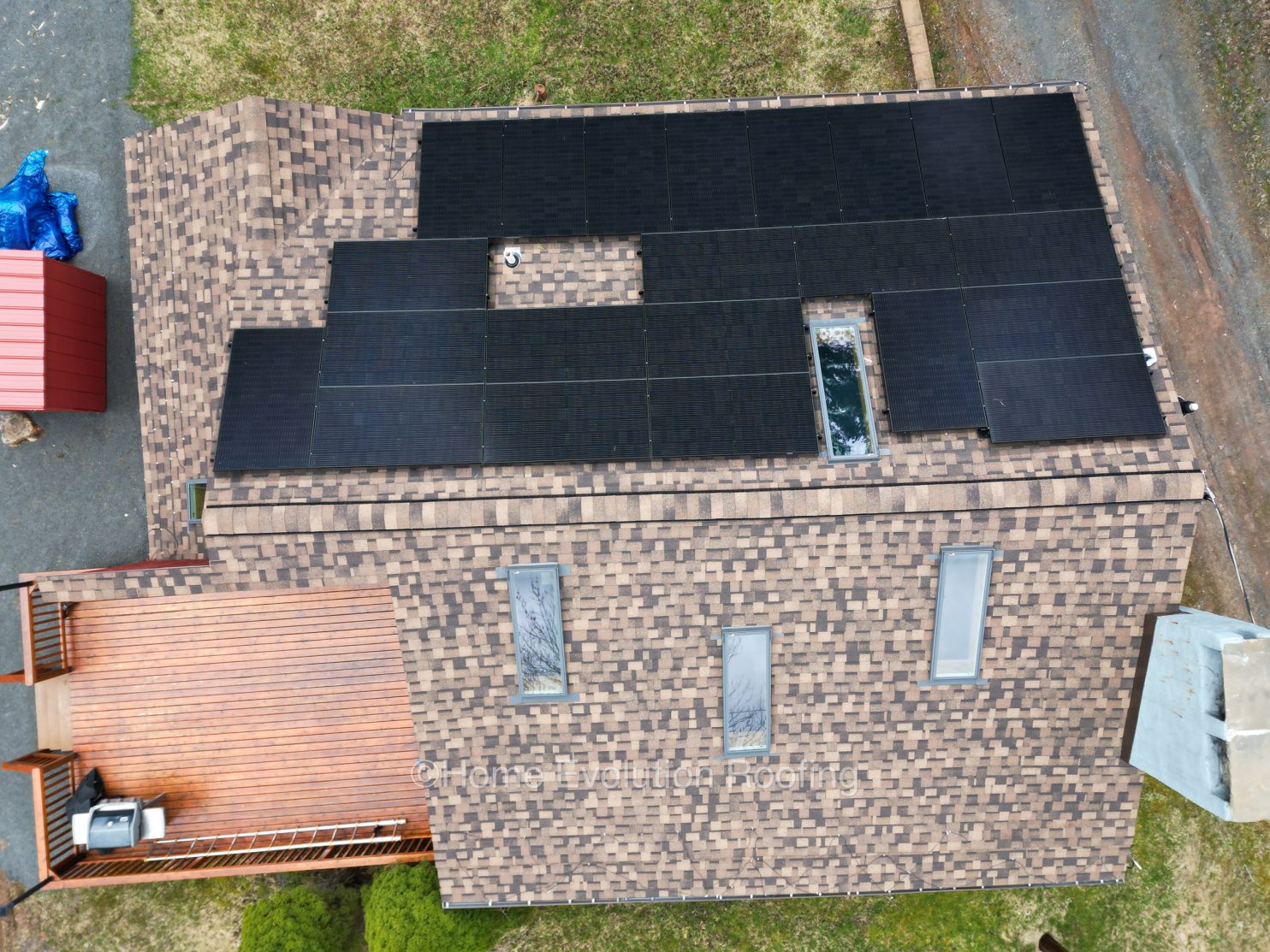 Local roofers working on a residential roof in Rensselaer NY.