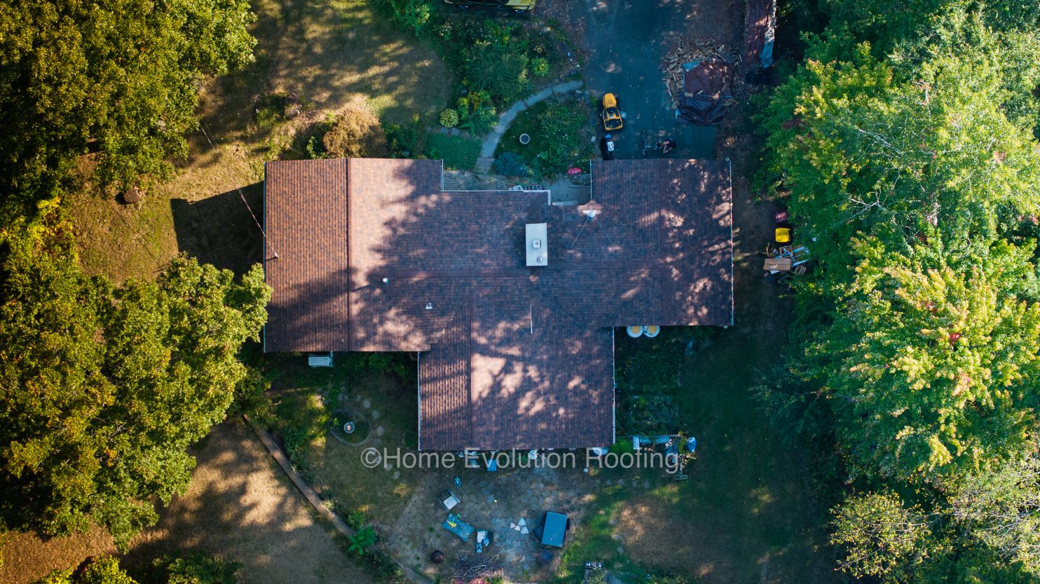 A newly installed roof in Cohoes NY featuring high-quality shingles for durability and style.