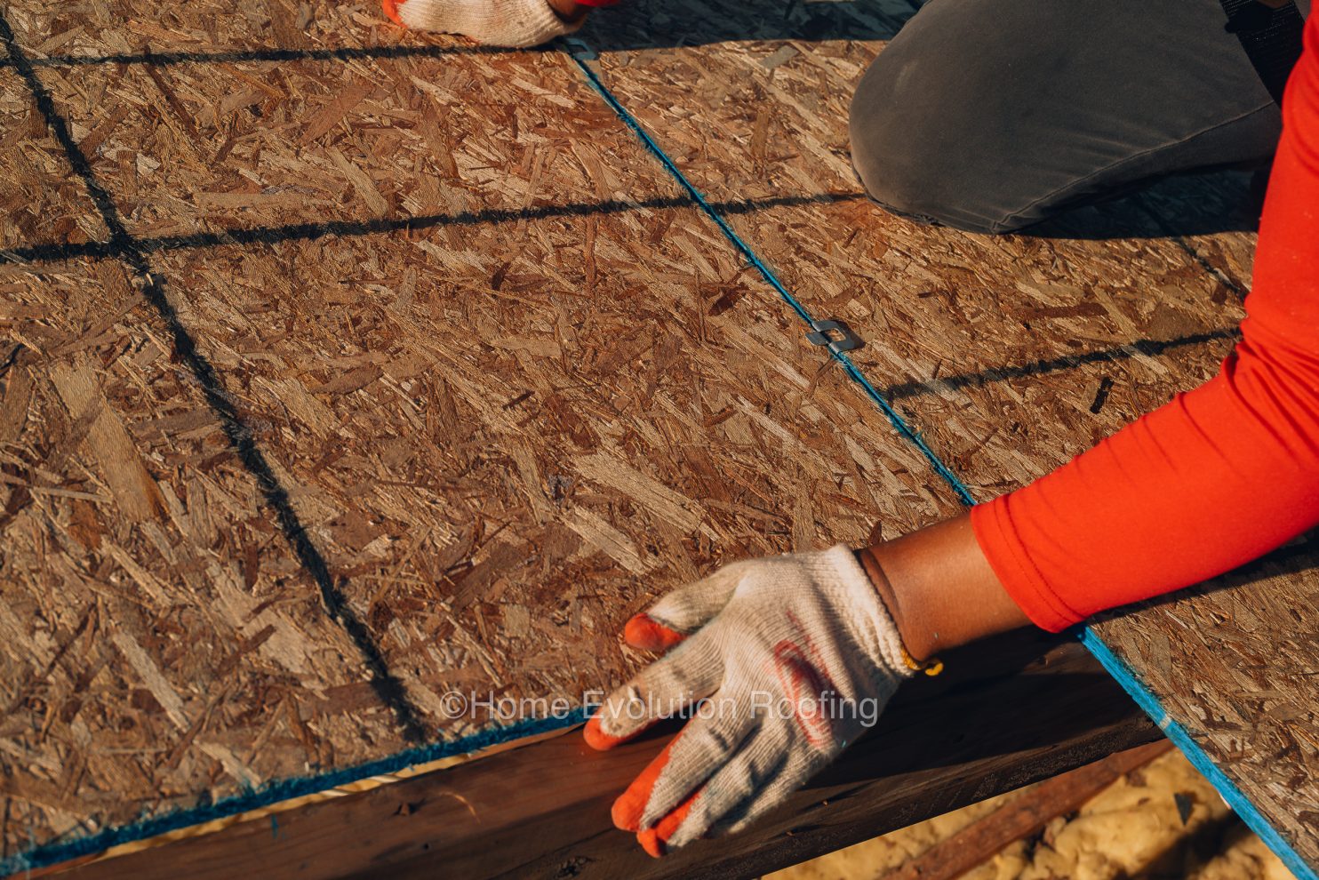 A worn-out roof on a Troy NY home showing missing shingles and visible damage.