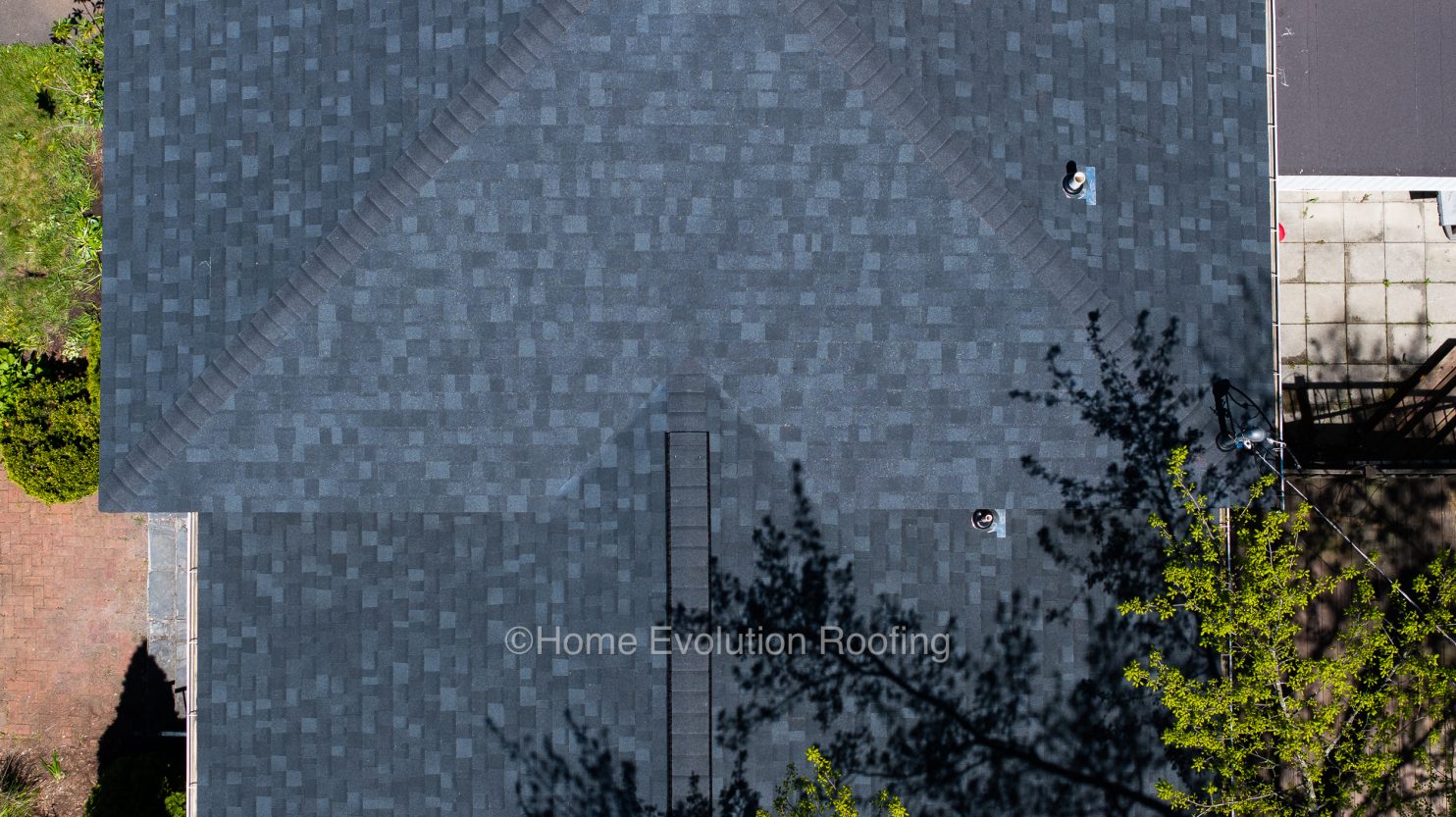 Commercial flat roof inspection by Home Evolution Roofing in Saratoga Springs