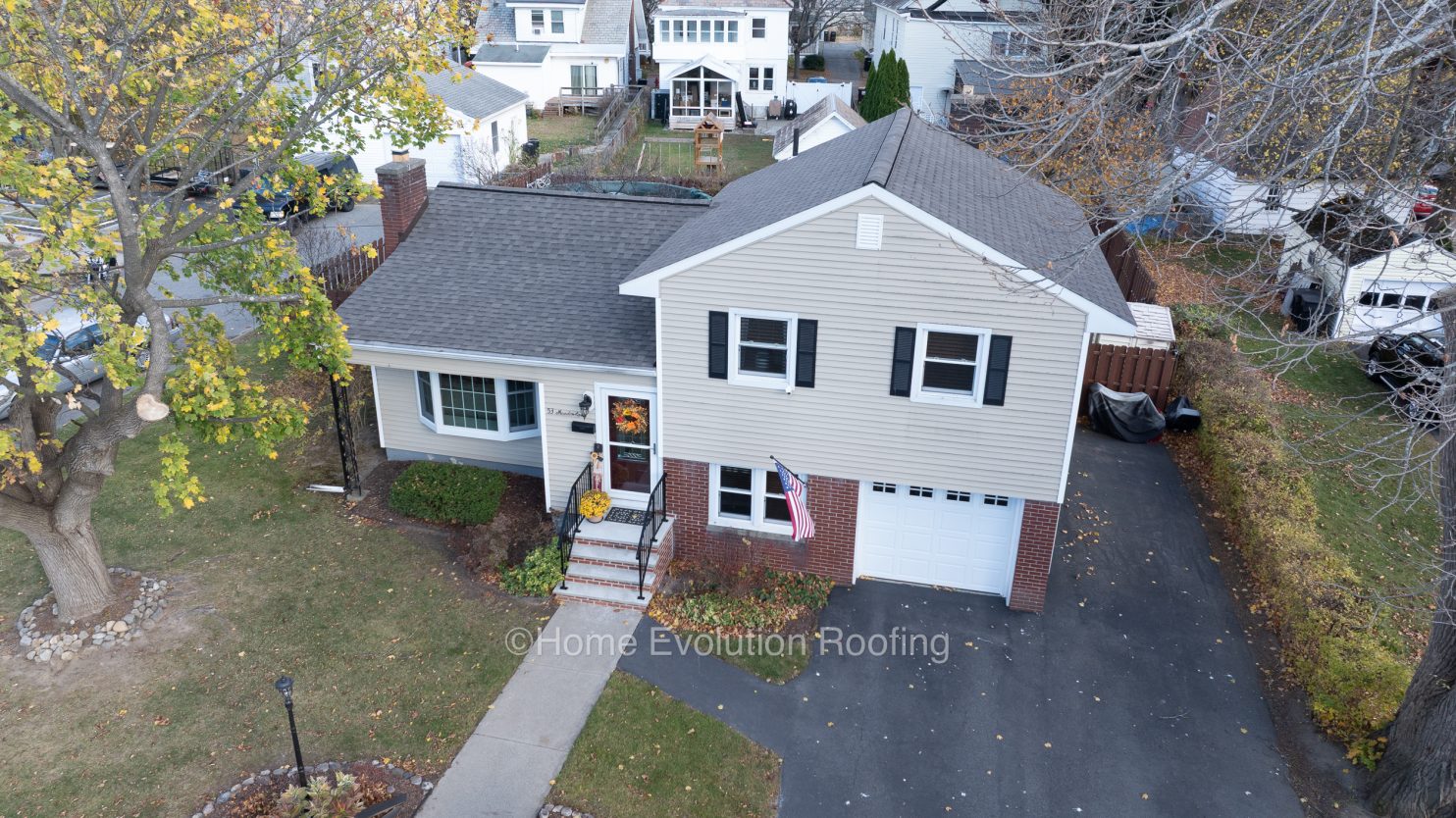 Manchester VT roofing crew installing a new summer roof system