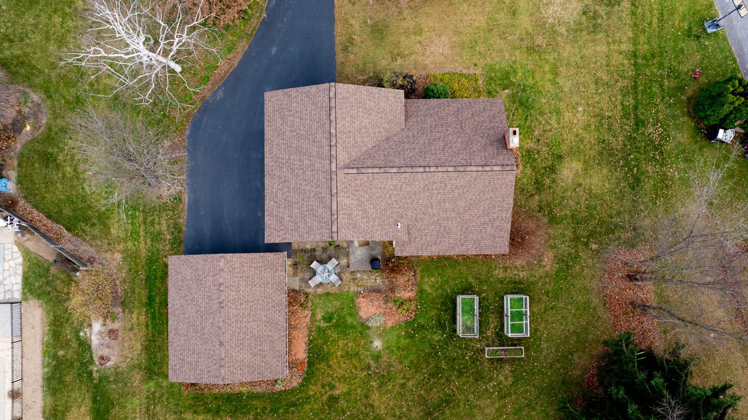 Experienced roofing contractor restoring historic home roof in Poughkeepsie, NY