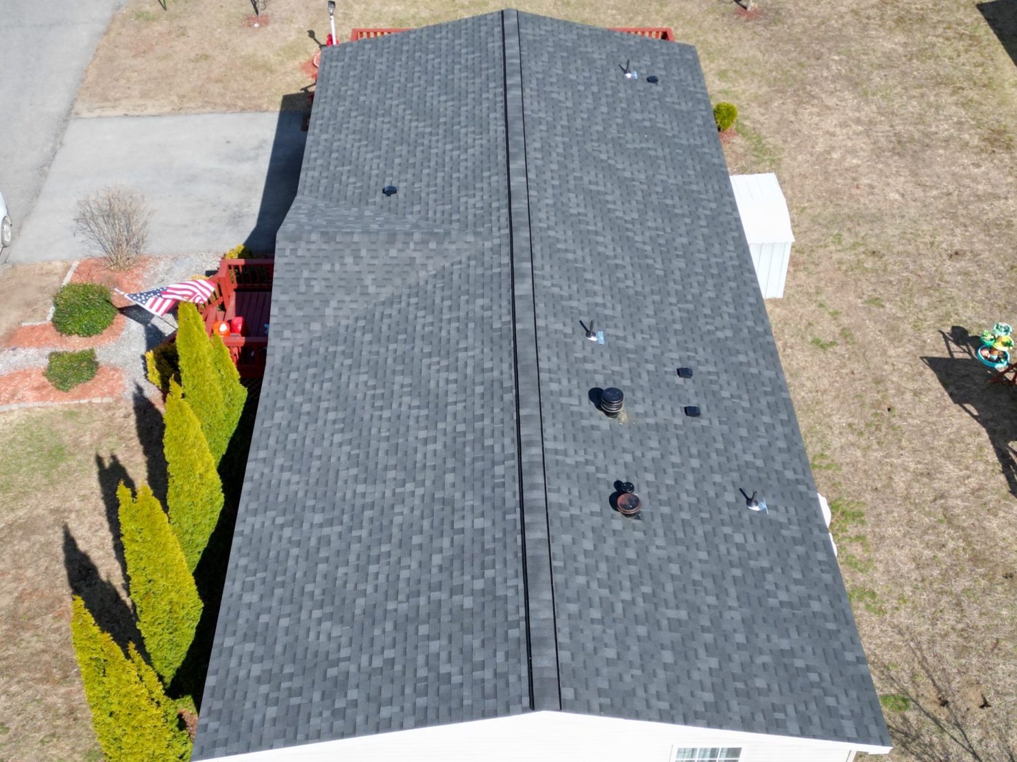 Shingle and metal roofing samples shown to Poughkeepsie homeowner