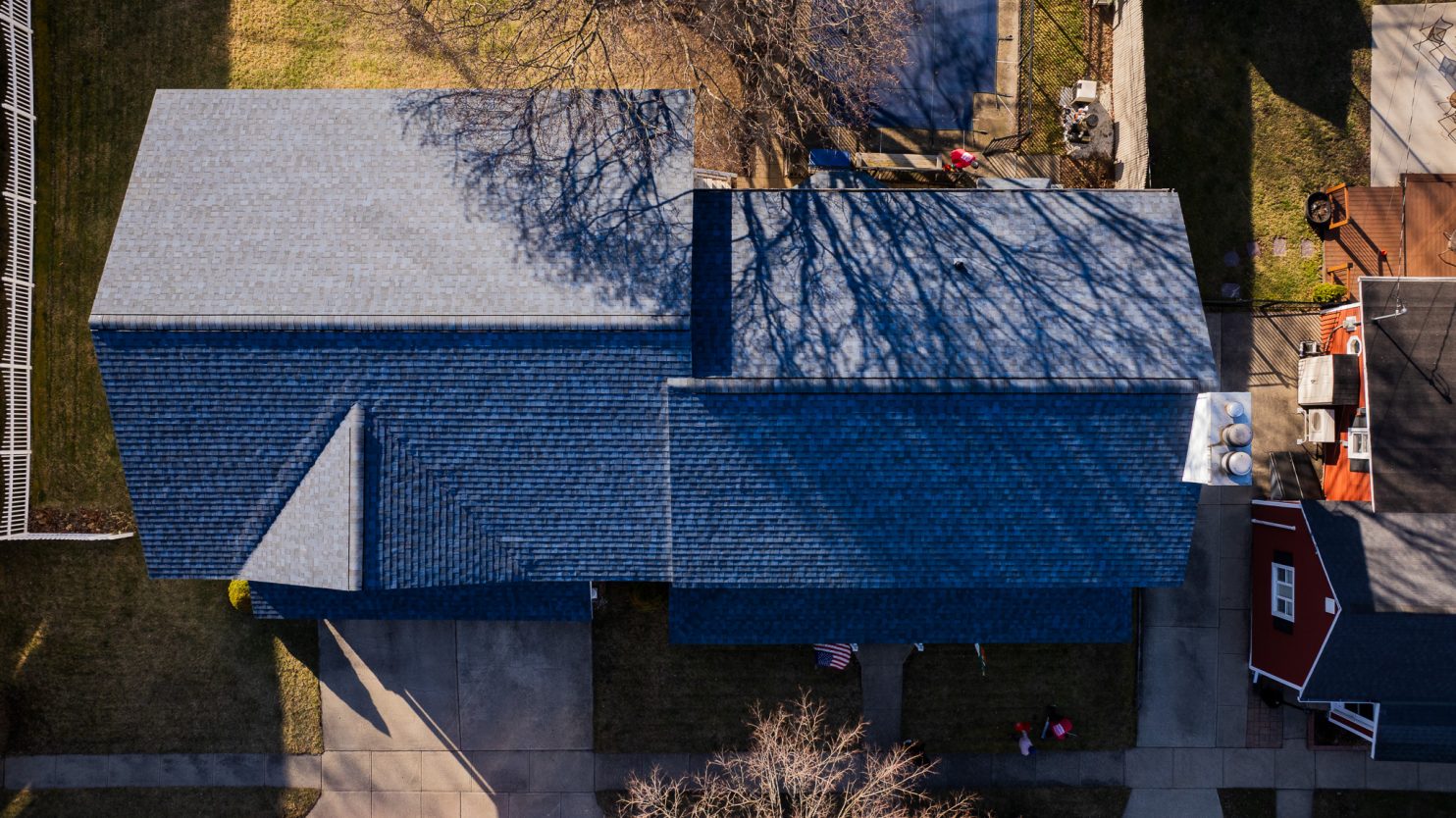 Roofing contractor working on a residential roof in Albany NY