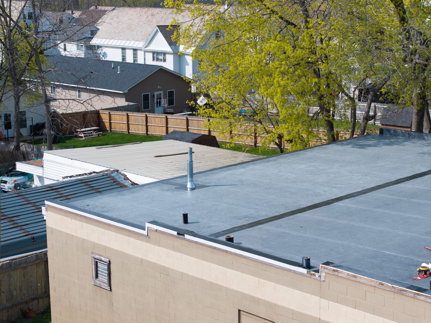 Flat roof installation on an industrial building in Utica NY