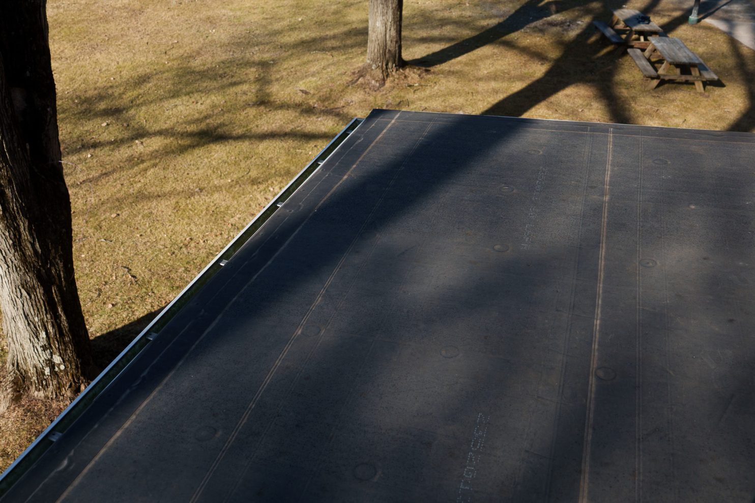 EPDM roofing installation on a flat commercial roof in Saratoga Springs NY