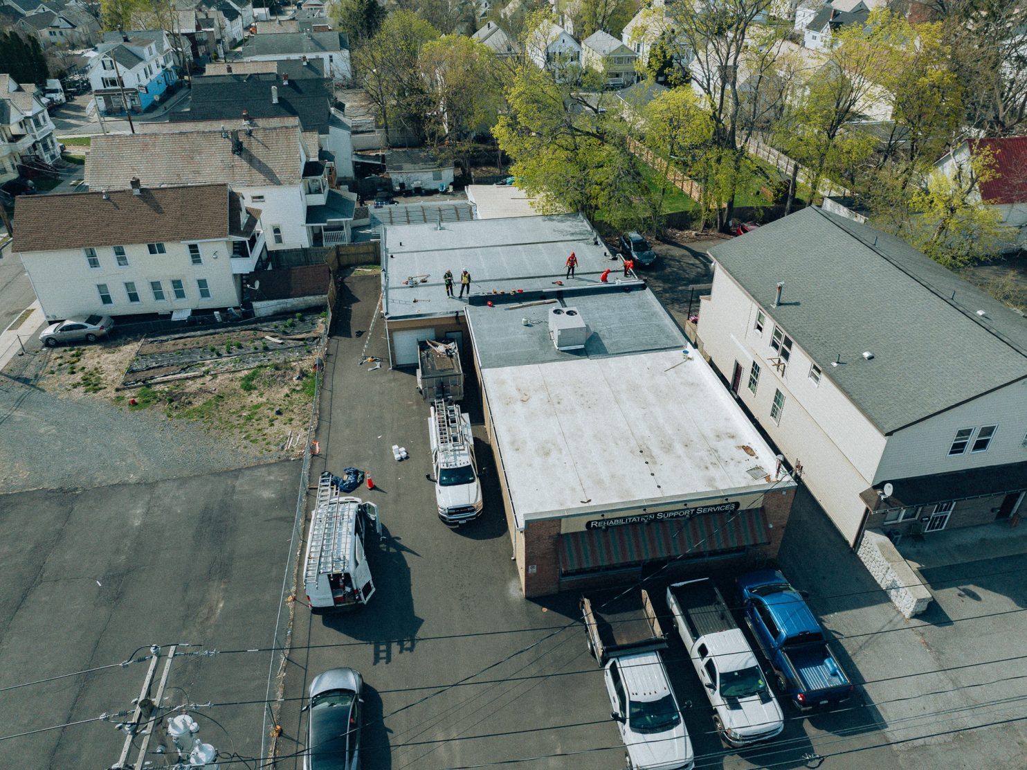 Flat roof inspection on Utica commercial building