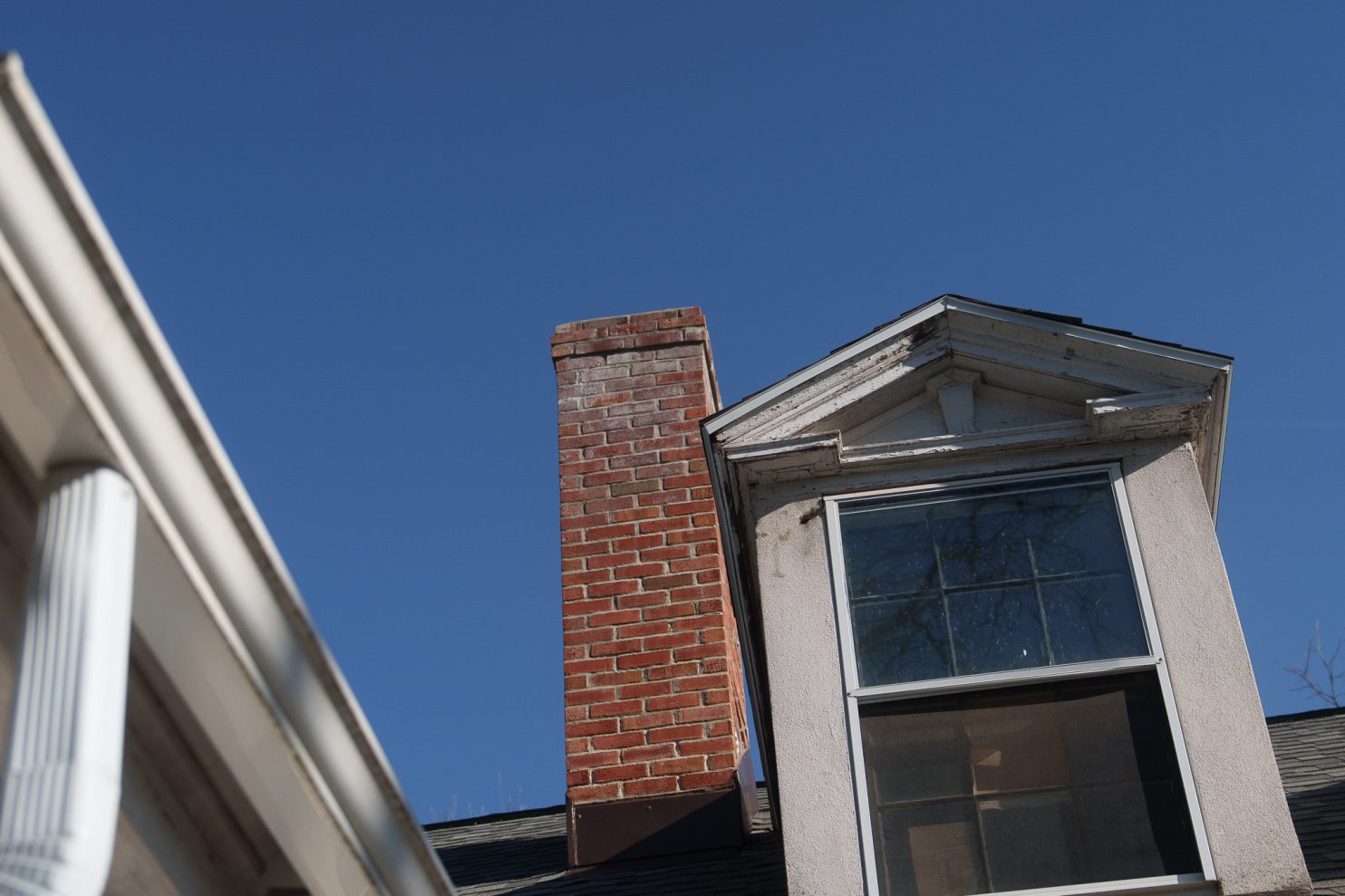 Chimney rebuild in progress on historic Saratoga Springs home