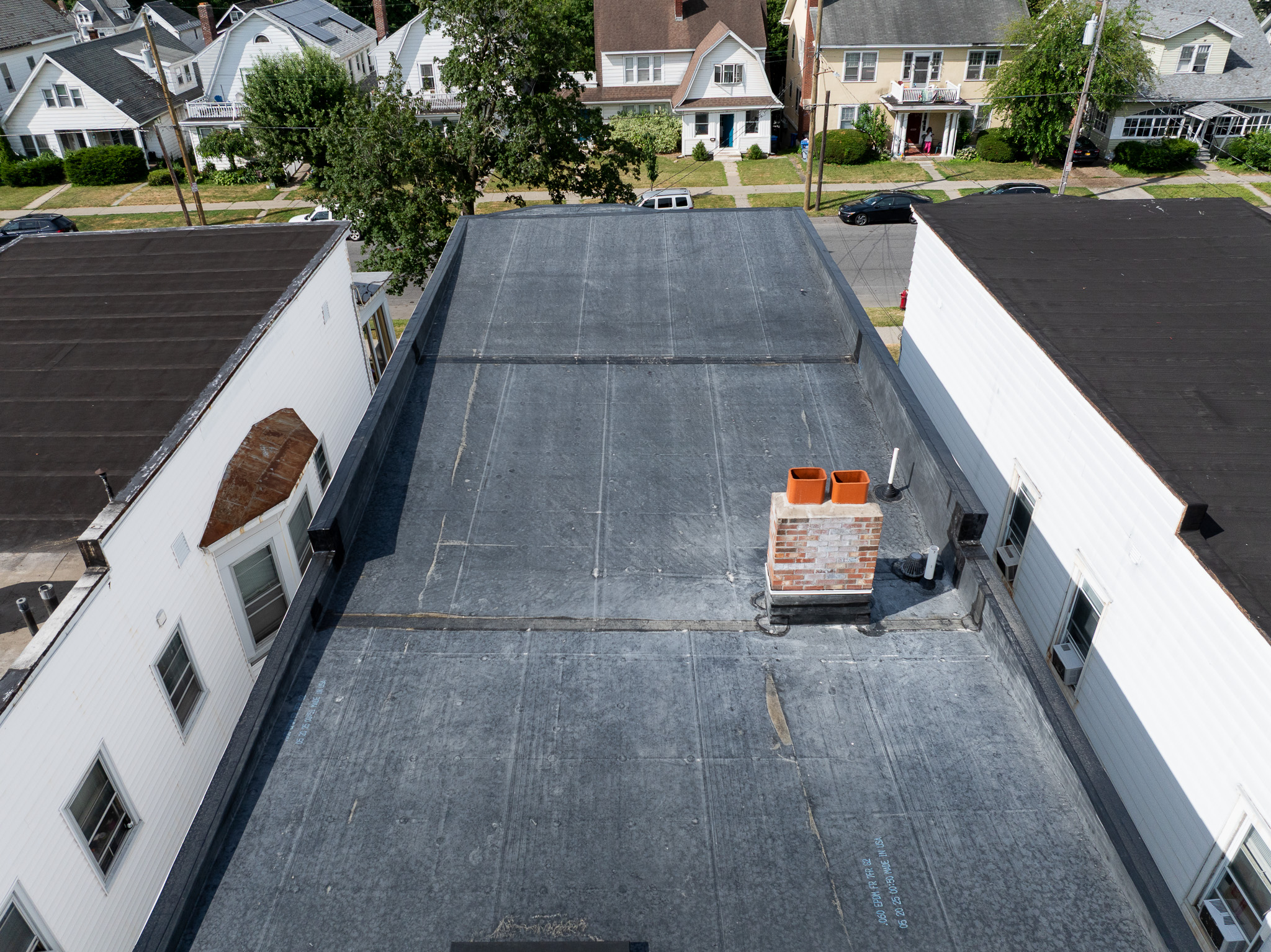 Featured image for “EPDM Installation for Albany, NY Commercial Buildings: Process and Benefits”