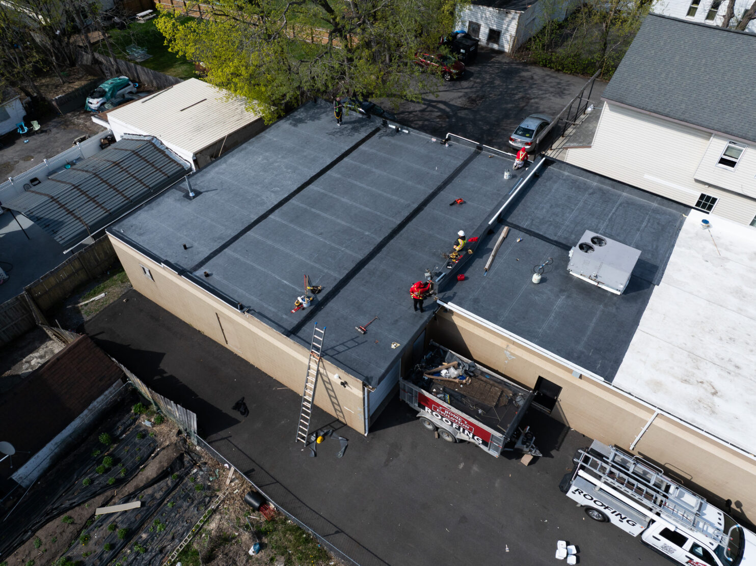 EPDM roofing installation on a Schenectady warehouse.