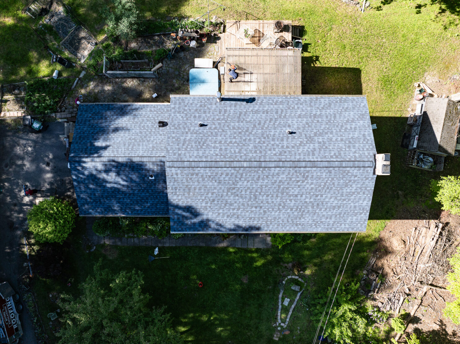 Roofing contractor repairing residential roof in Poughkeepsie NY