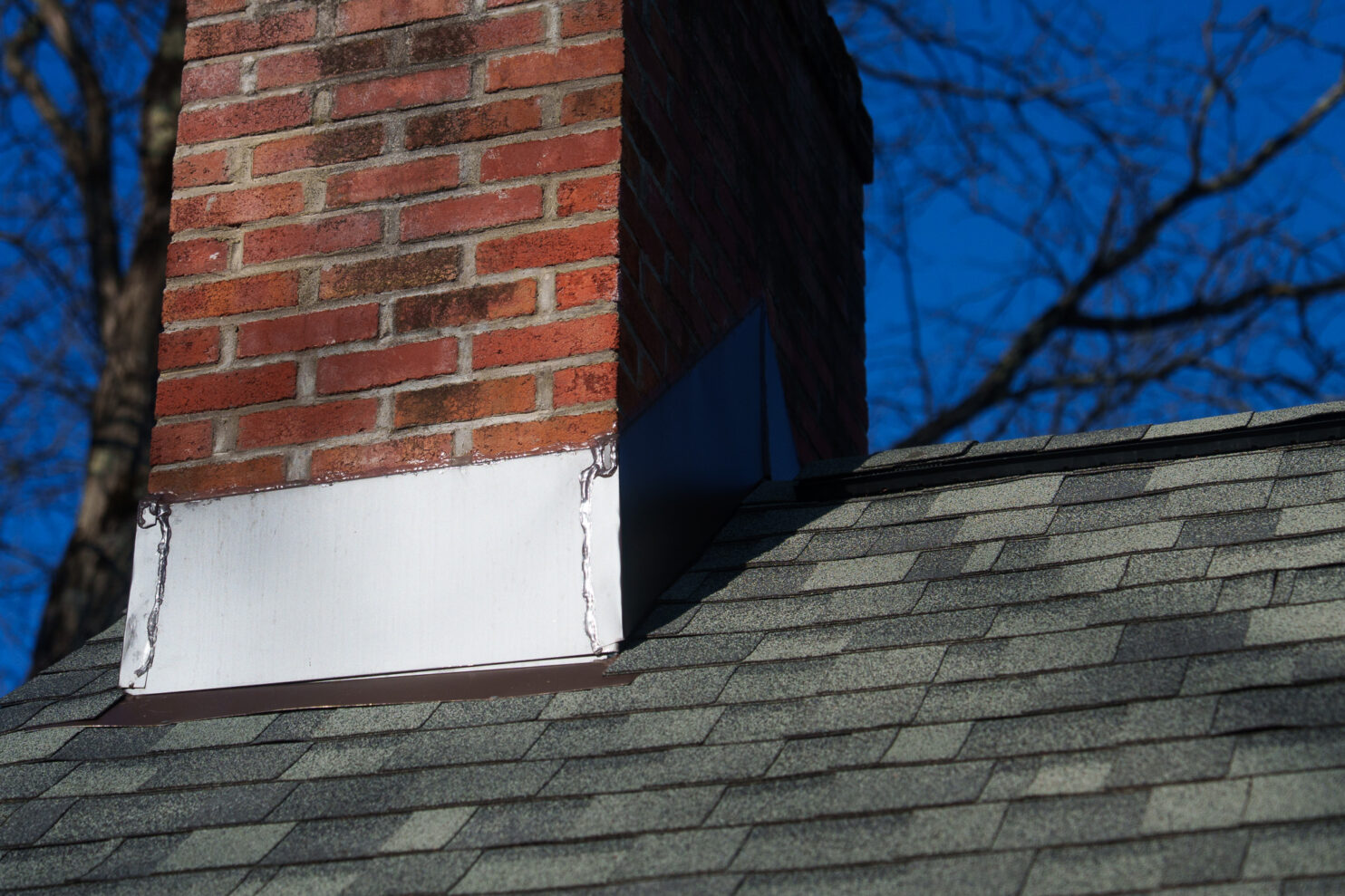 Historic brick chimney repair in Albany NY by Home Evolution Roofing