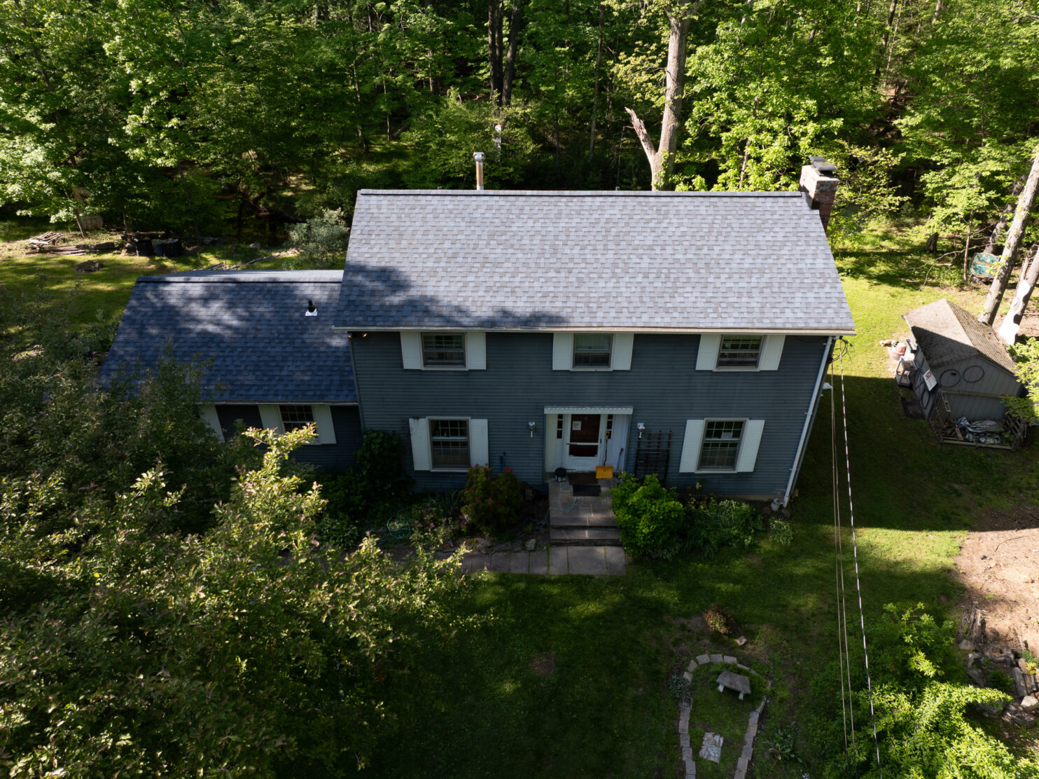 Roof repair on a historic Utica NY home with slate shingles