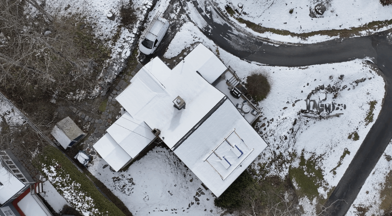 roofing contractor in Albany NY providing winter roof repair service