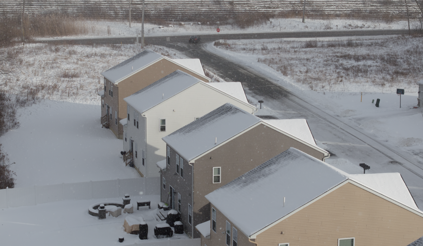 Roofing contractor inspecting residential roof in Poughkeepsie NY Dutchess County