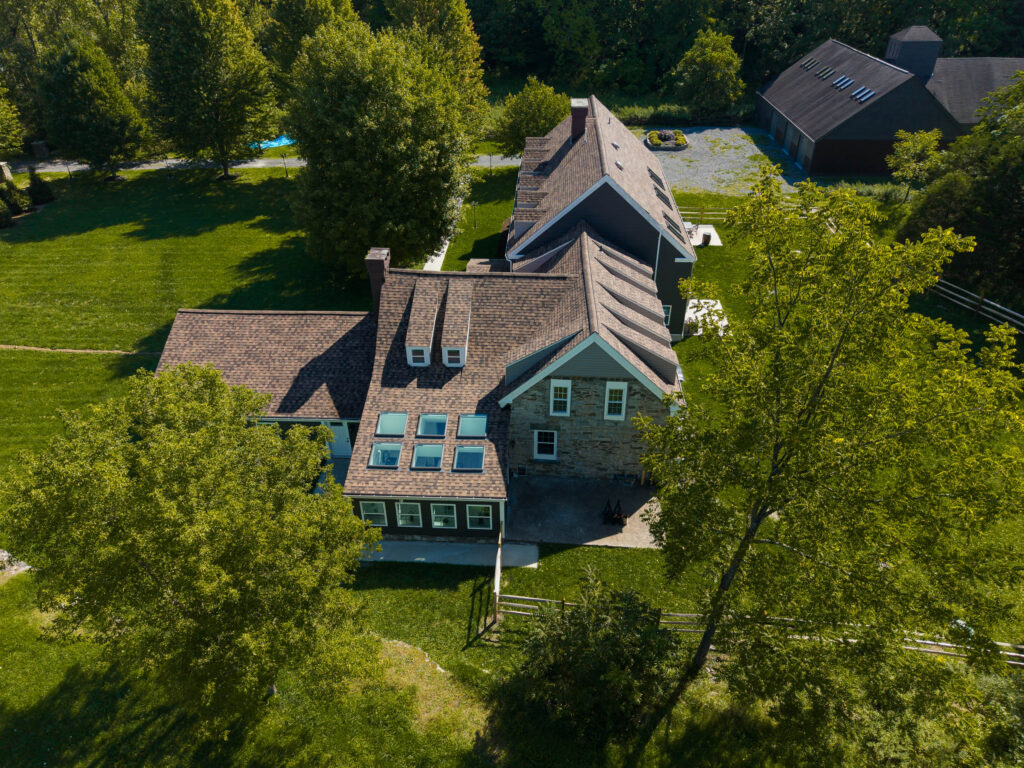 Completed roof replacement on historic stone farmhouse in Kingston Ulster County NY