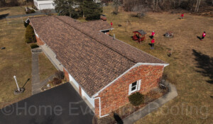 Residential roofing project in Amsterdam, NY, featuring a modern and durable shingle design.
