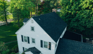 Emergency roof repair in Albany, NY, after storm damage.