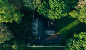 Roof maintenance and repair in Albany, NY, replacing worn shingles.