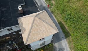 Roof vent and flashing repair in Saratoga Springs, NY, ensuring proper waterproofing.
