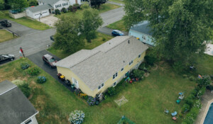 Emergency roof leak repair in Oneonta, NY, preventing interior water damage.