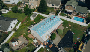 Roof leak and flashing repair in Amsterdam, NY, preventing future water damage.